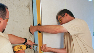 installing a basement wall finishing system in Clay