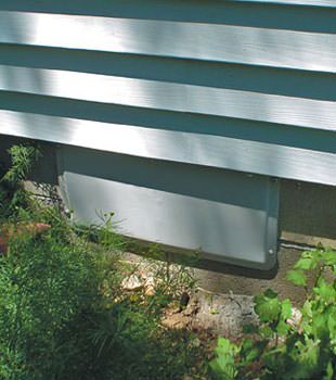 A gray crawl space vent cover in Oswego