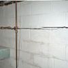 Severe foundation damage from a long crack in a bucking wall of a Endicott home.