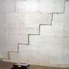 A diagonal stair step crack along the foundation wall of a Baldwinsville home