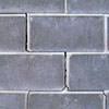 A diagonal stair-step crack found along a foundation wall in a Cortland home