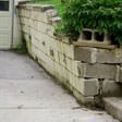 a collapsing retaining wall in Elmira