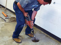 Coring the concrete of a concrete slab floor in Cicero
