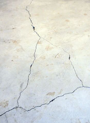 severely cracked, heaving slab floors in a home in Horseheads