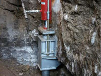 Foundation repair contractors lifting a structure in Binghamton.