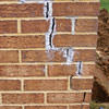 Tuckpointing that cracked due to foundation settlement of a Binghamton home