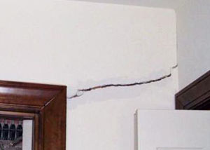 A large drywall crack in an interior wall in Rochester