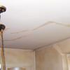 Drywall cracks in Ithaca that were poorly patched and repaired.