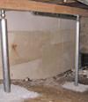 A system of crawl space support posts adding structural support to a crawl space in Oneonta
