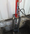 Syracuse foundation with settlement issues being lifted by push piers that were installed by our contractors