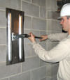 Tightening a wall anchor plate in Liverpool, New York