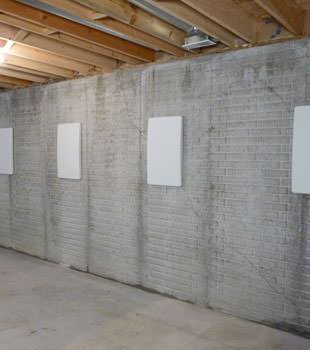 Wall anchor covers covering a foundation wall repair system in Penfield, Watertown, Cicero, Endicott, Auburn
