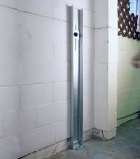 A failing foundation wall repaired with a foundation wall channel anchor system in a Liverpool home.