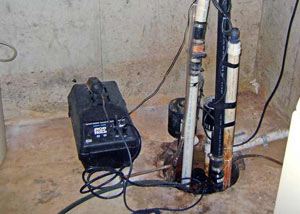 Pedestal sump pump system installed in a home in Auburn