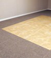 tiled and carpeted basement flooring installed in a Ithaca home